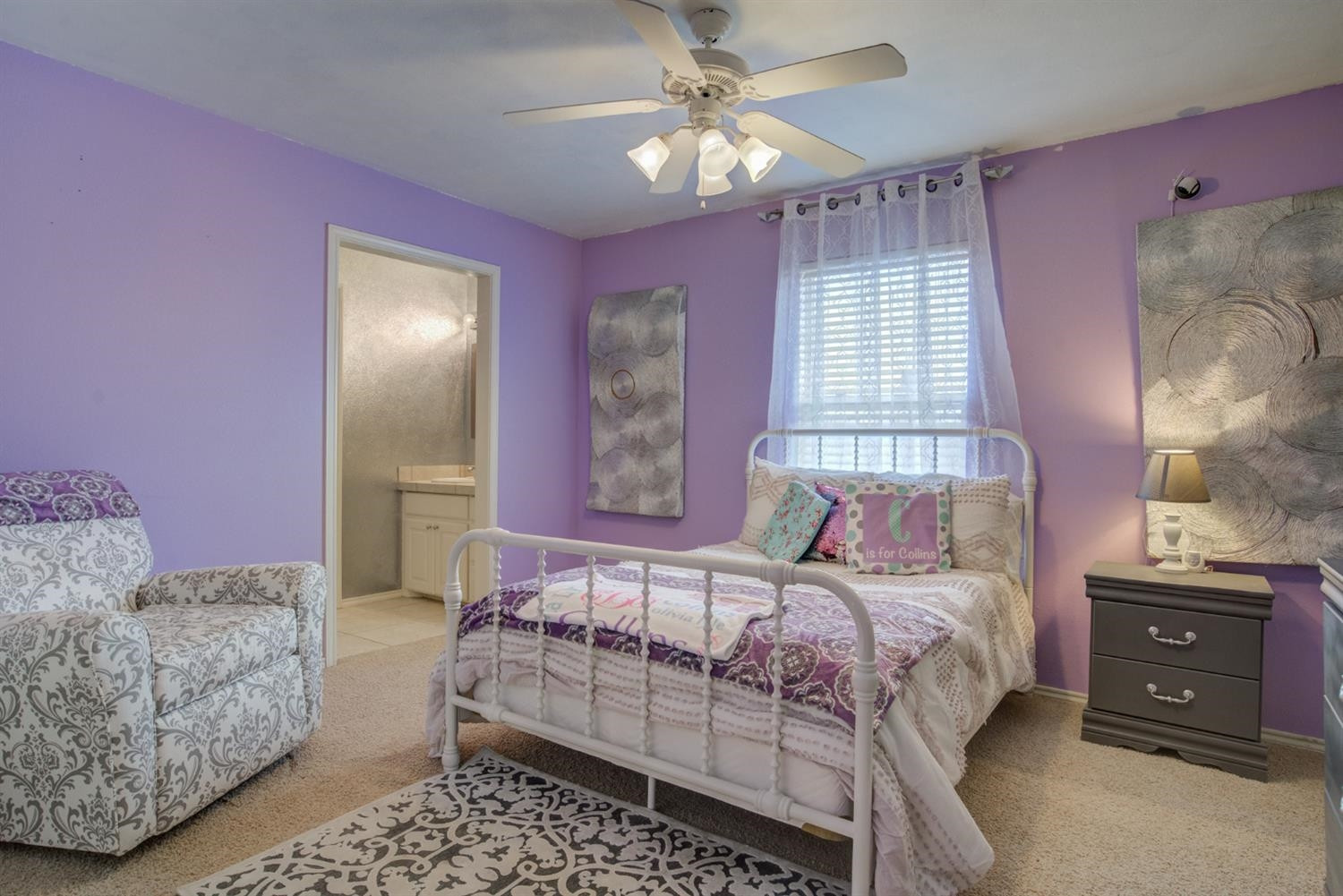 5904 110th Street Lubbock, TX 79424 - Photo 36 of 50 a bedroom with a bed and a couch