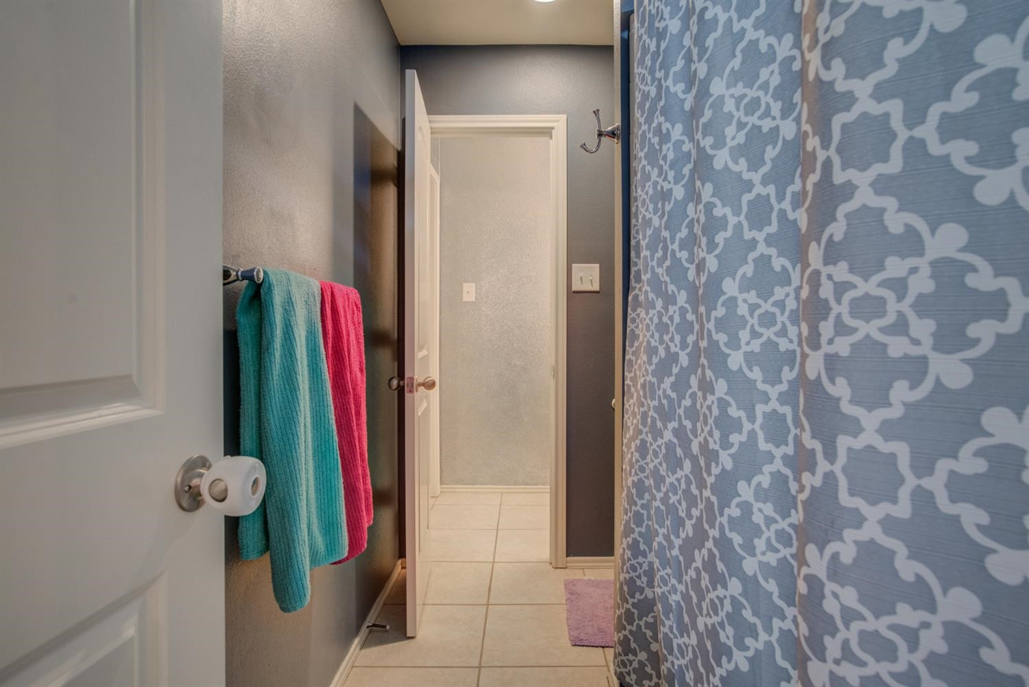 5904 110th Street Lubbock, TX 79424 - Photo 39 of 50 a room with a door and a shower