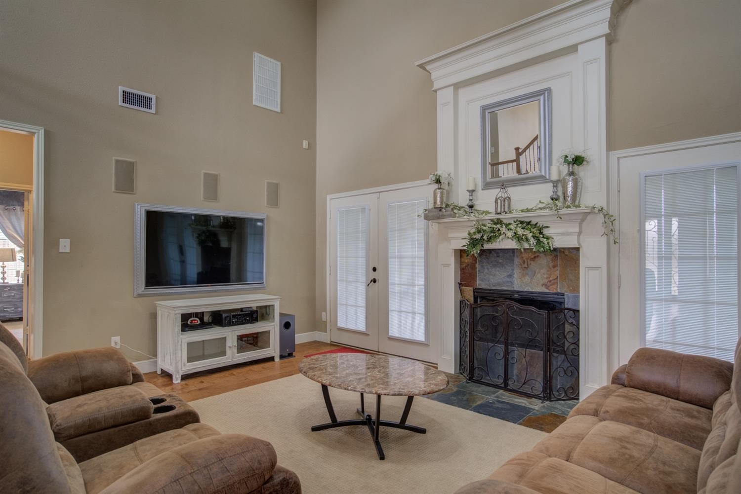 5904 110th Street Lubbock, TX 79424 - Photo 8 of 50 a living room with furniture and a flat screen tv