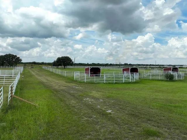 a view of an empty room and a window