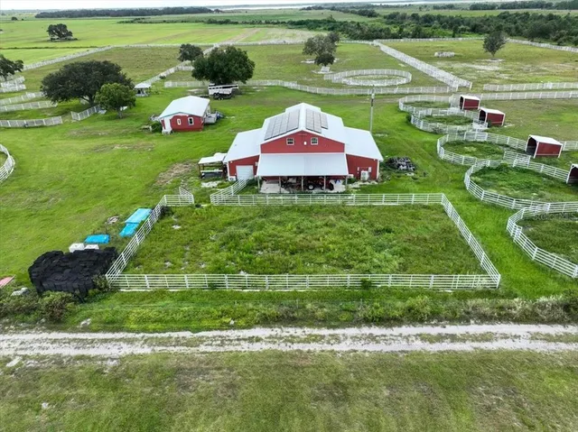 a view of a kitchen with a sink and cabinets