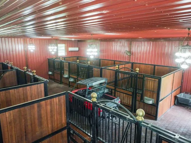 a bathroom with a shower and a sink