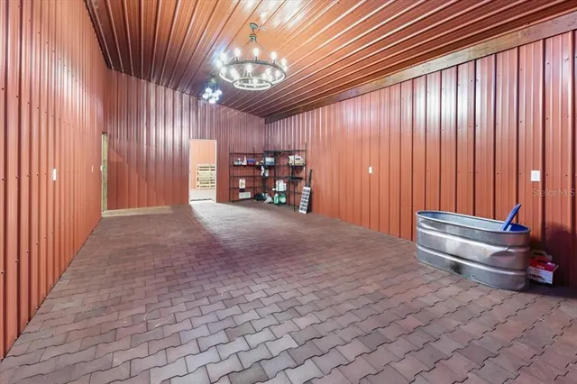 a kitchen with a refrigerator and countertop