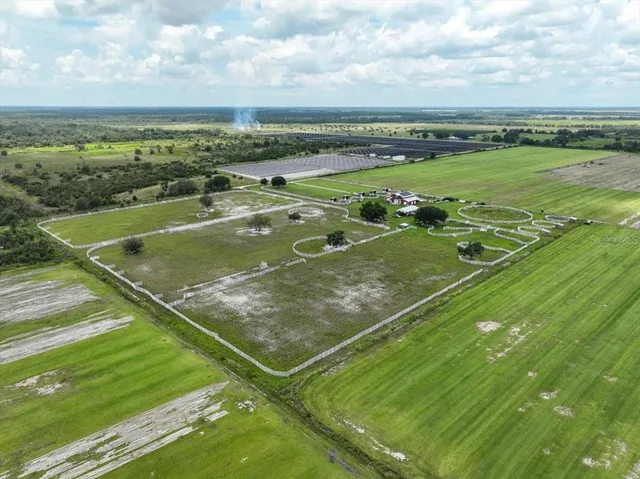 a view of a lake with a yard and lake view