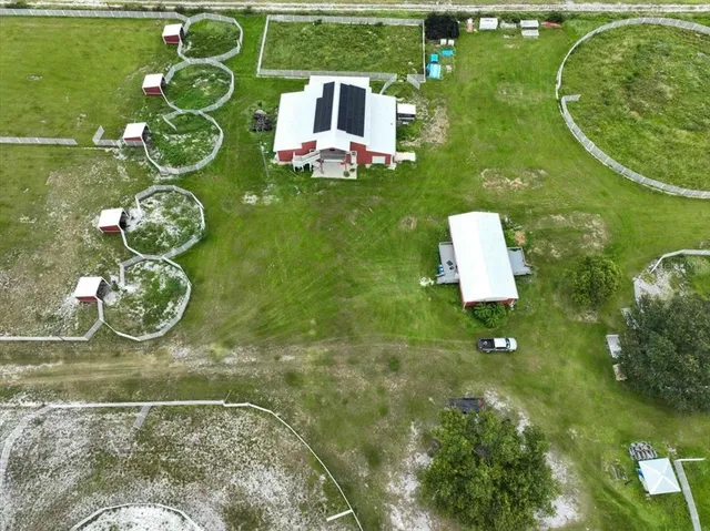a view of a house with a big yard
