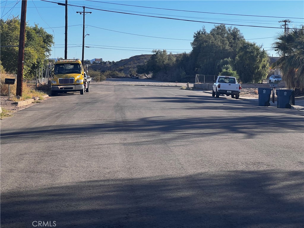 521 Quivera Street Needles, CA 92363 - Photo 13 of 17 a car parked on the side of the road
