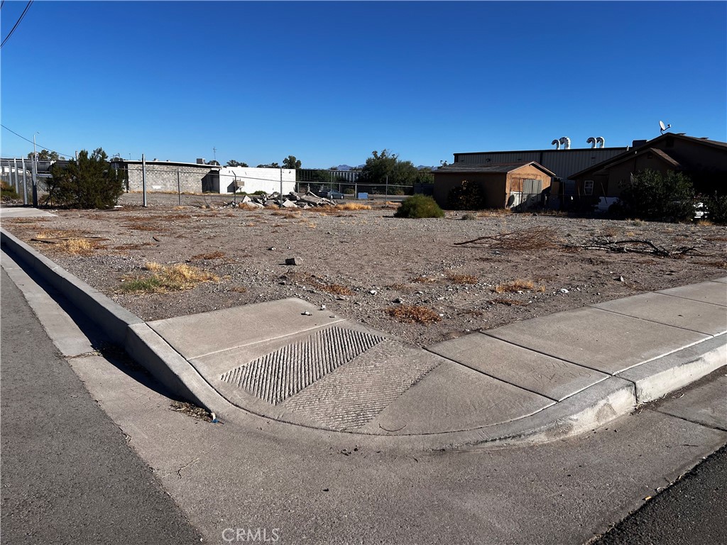 521 Quivera Street Needles, CA 92363 - Photo 3 of 17 a view of outdoor space and yard
