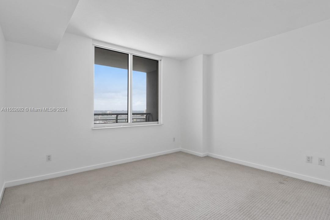 325 South Biscayne Boulevard, Unit 2118 Miami, FL 33131 - Photo 14 of 22 a view of an empty room with a window