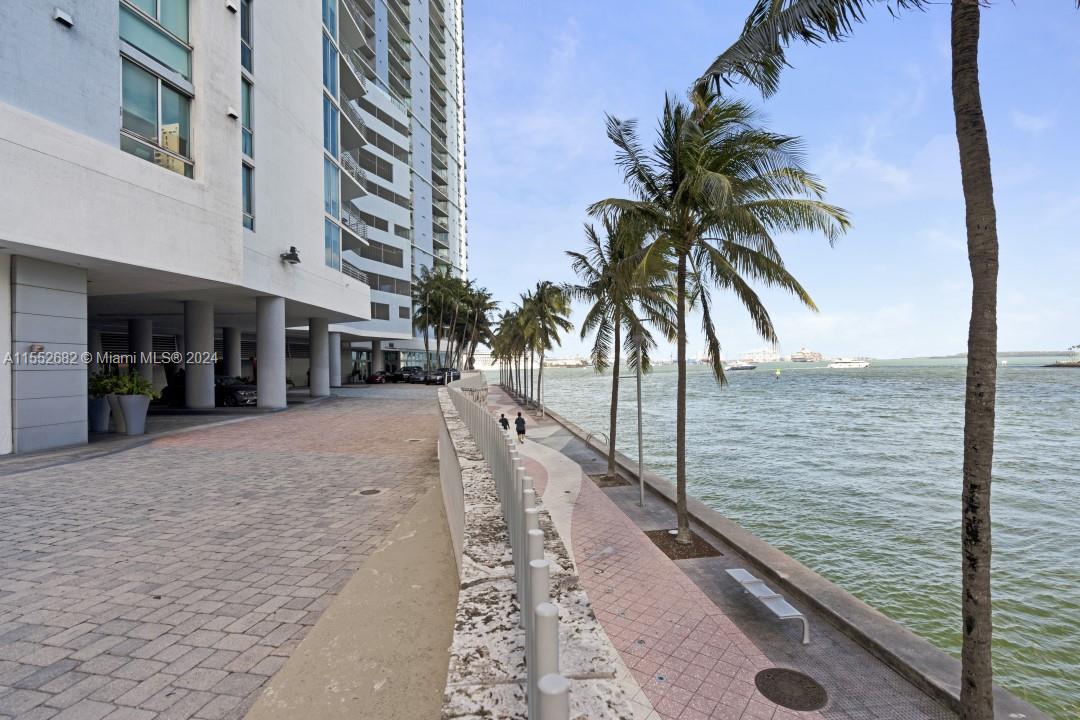 325 South Biscayne Boulevard, Unit 2118 Miami, FL 33131 - Photo 21 of 22 a view of a backyard with palm trees