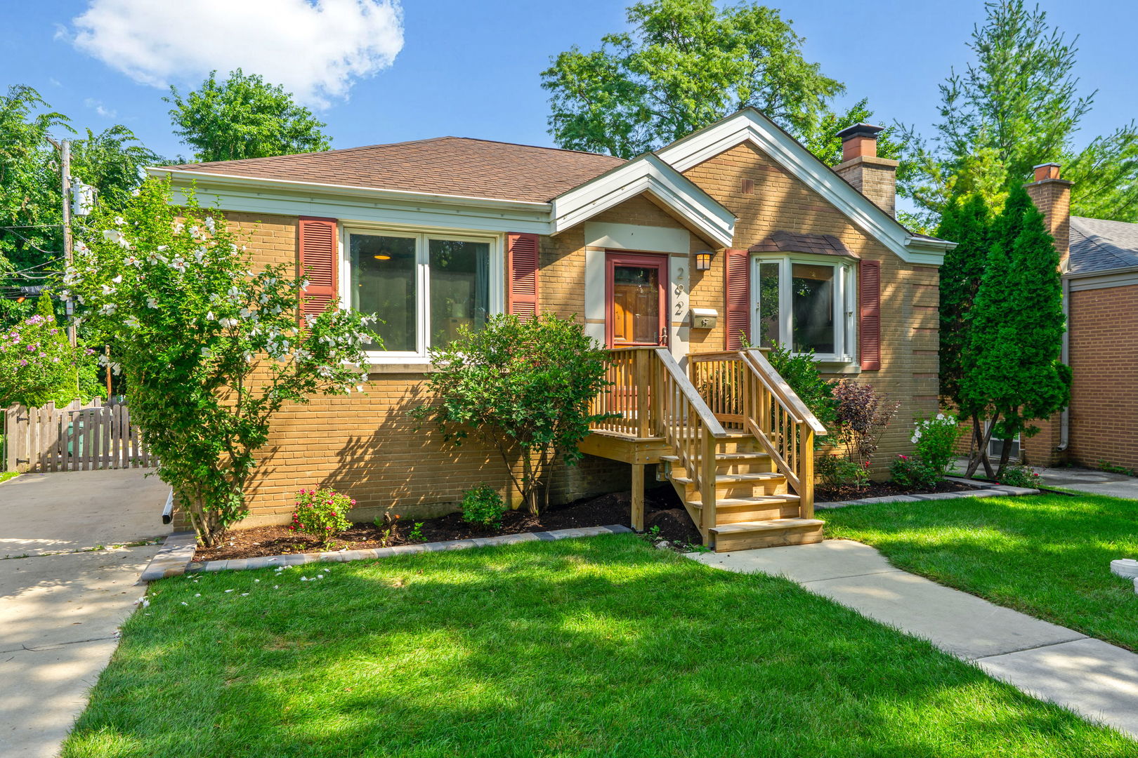 292 East Burlington Street Riverside, IL 60546 - Photo 1 of 32 a front view of a house with a yard