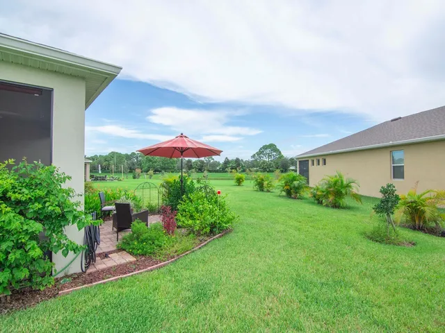 a view of a back yard of the house