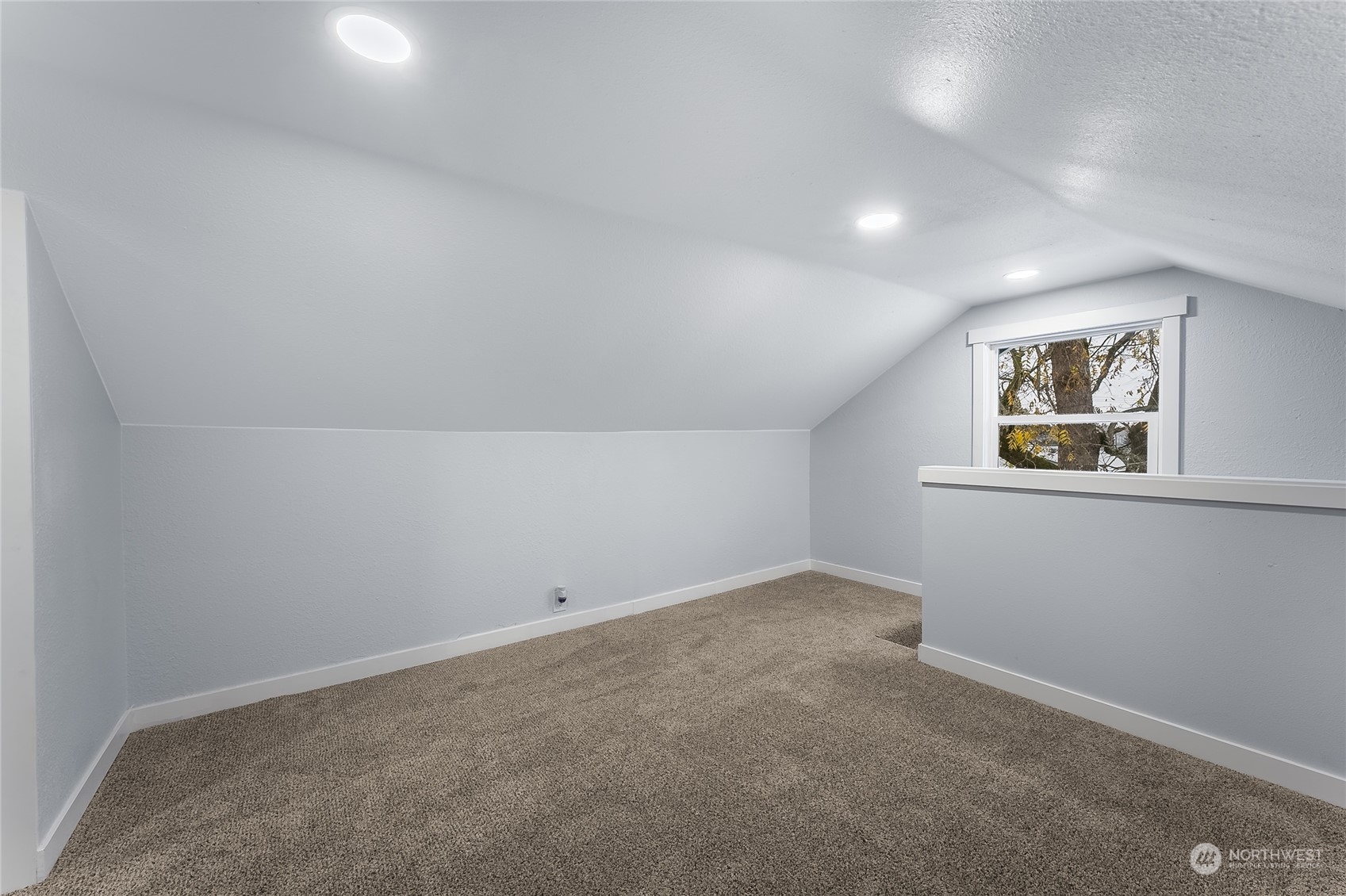 3217 South Durango Street Tacoma, WA 98409 - Photo 15 of 21 an empty room with a painting