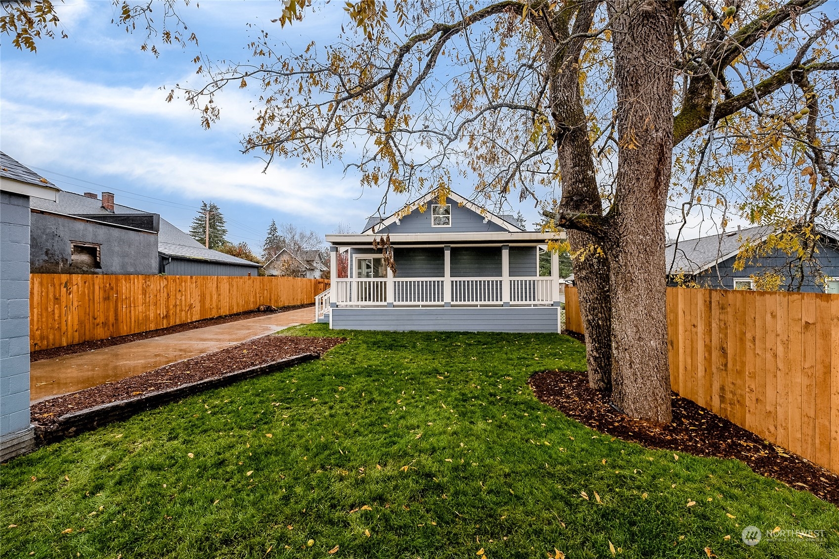 3217 South Durango Street Tacoma, WA 98409 - Photo 19 of 21 a view of a house with a yard