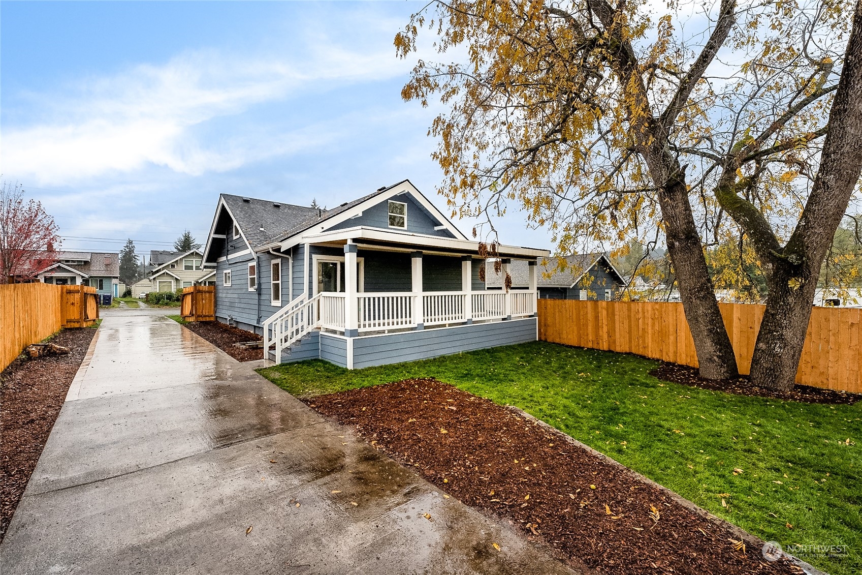 3217 South Durango Street Tacoma, WA 98409 - Photo 20 of 21 a view of a house with a yard