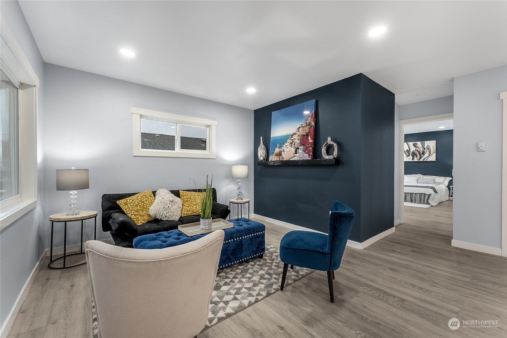 3217 South Durango Street Tacoma, WA 98409 - Photo 4 of 21 a living room with furniture and a wooden floor