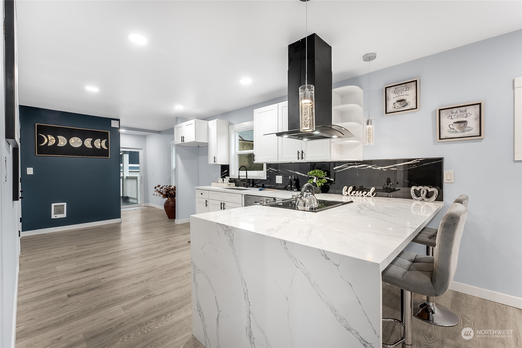 3217 South Durango Street Tacoma, WA 98409 - Photo 8 of 21 a view of kitchen with refrigerator stove and wooden floor