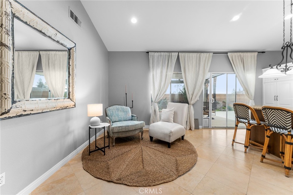 4021 North Larkspur Avenue Rialto, CA 92377 - Photo 15 of 40 a living room with furniture and a table