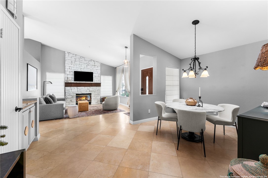 4021 North Larkspur Avenue Rialto, CA 92377 - Photo 16 of 40 a view of a livingroom with furniture and a flat screen tv