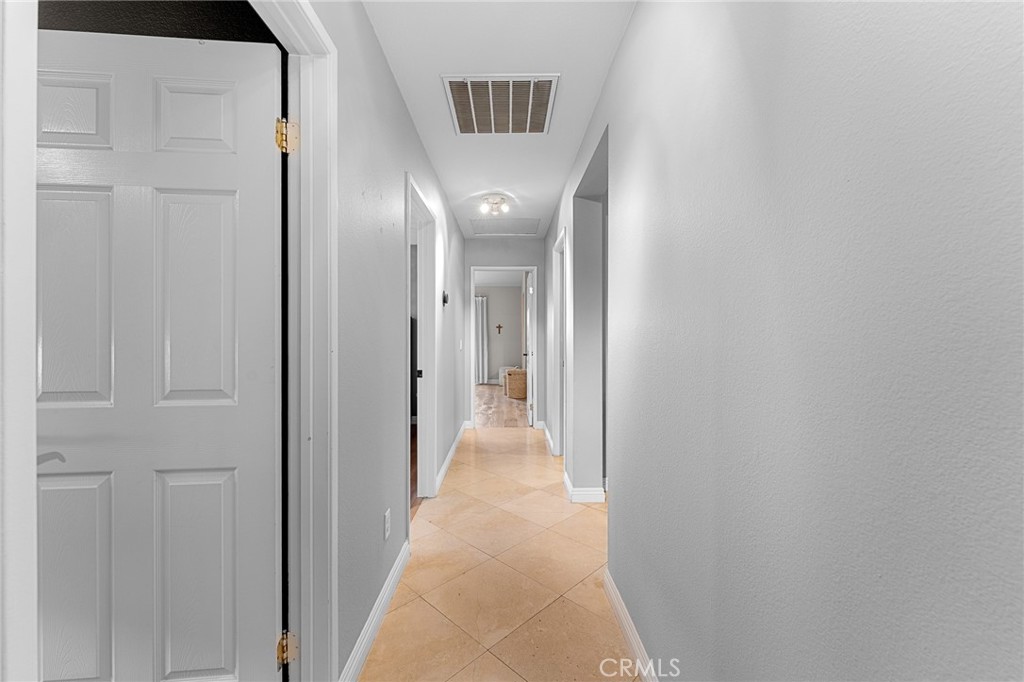 4021 North Larkspur Avenue Rialto, CA 92377 - Photo 18 of 40 a view of a hallway
