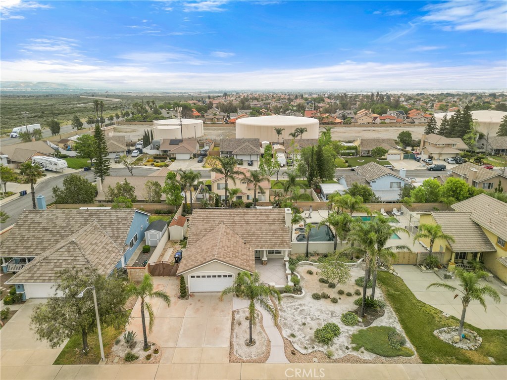 4021 North Larkspur Avenue Rialto, CA 92377 - Photo 39 of 40 an aerial view of residential houses with outdoor space