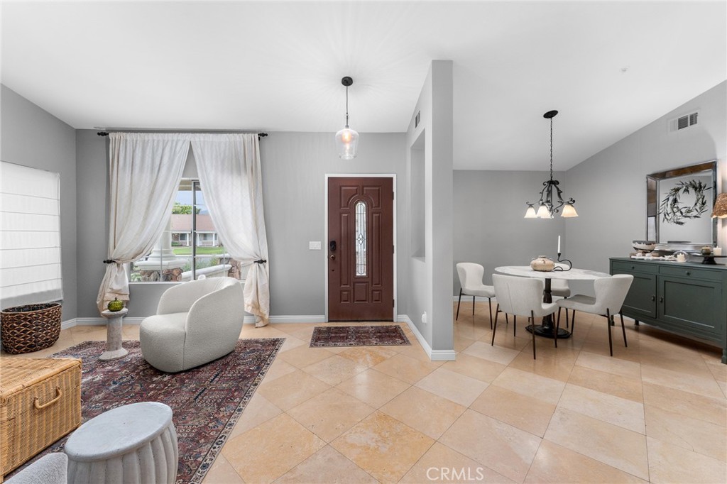4021 North Larkspur Avenue Rialto, CA 92377 - Photo 7 of 40 a living room with furniture and a window
