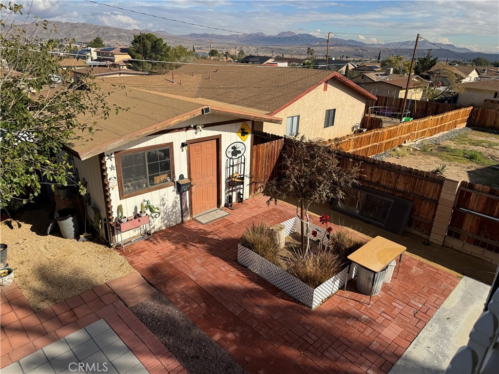 751 Rimrock Road Barstow, CA 92311 - Photo 15 of 33 a view of a house with pool and outdoor seating