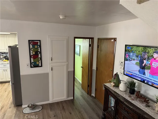 a room with furniture and wooden floor