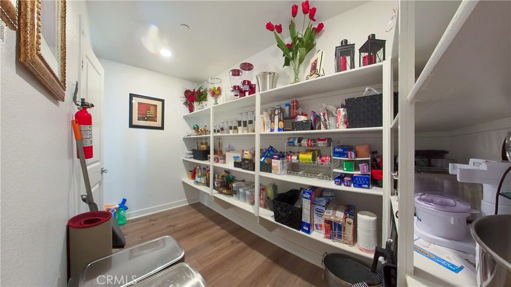 2411 Huron Road Rialto, CA 92377 - Photo 13 of 46 a room with storage and utility room