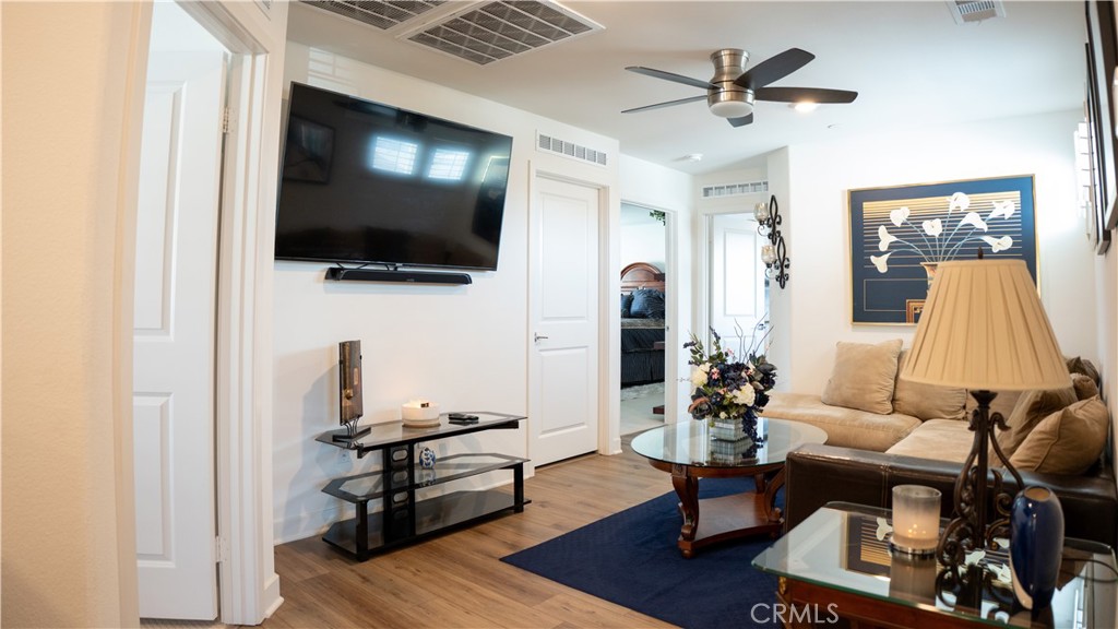 2411 Huron Road Rialto, CA 92377 - Photo 23 of 46 a living room with furniture and a flat screen tv