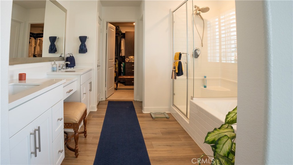 2411 Huron Road Rialto, CA 92377 - Photo 28 of 46 a bathroom with a sink and a large mirror
