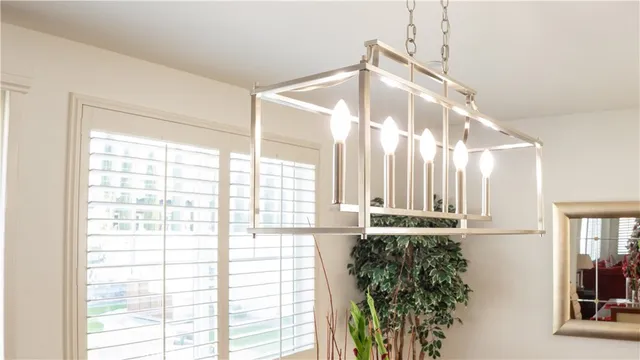 a very nice looking room with a large window and front door