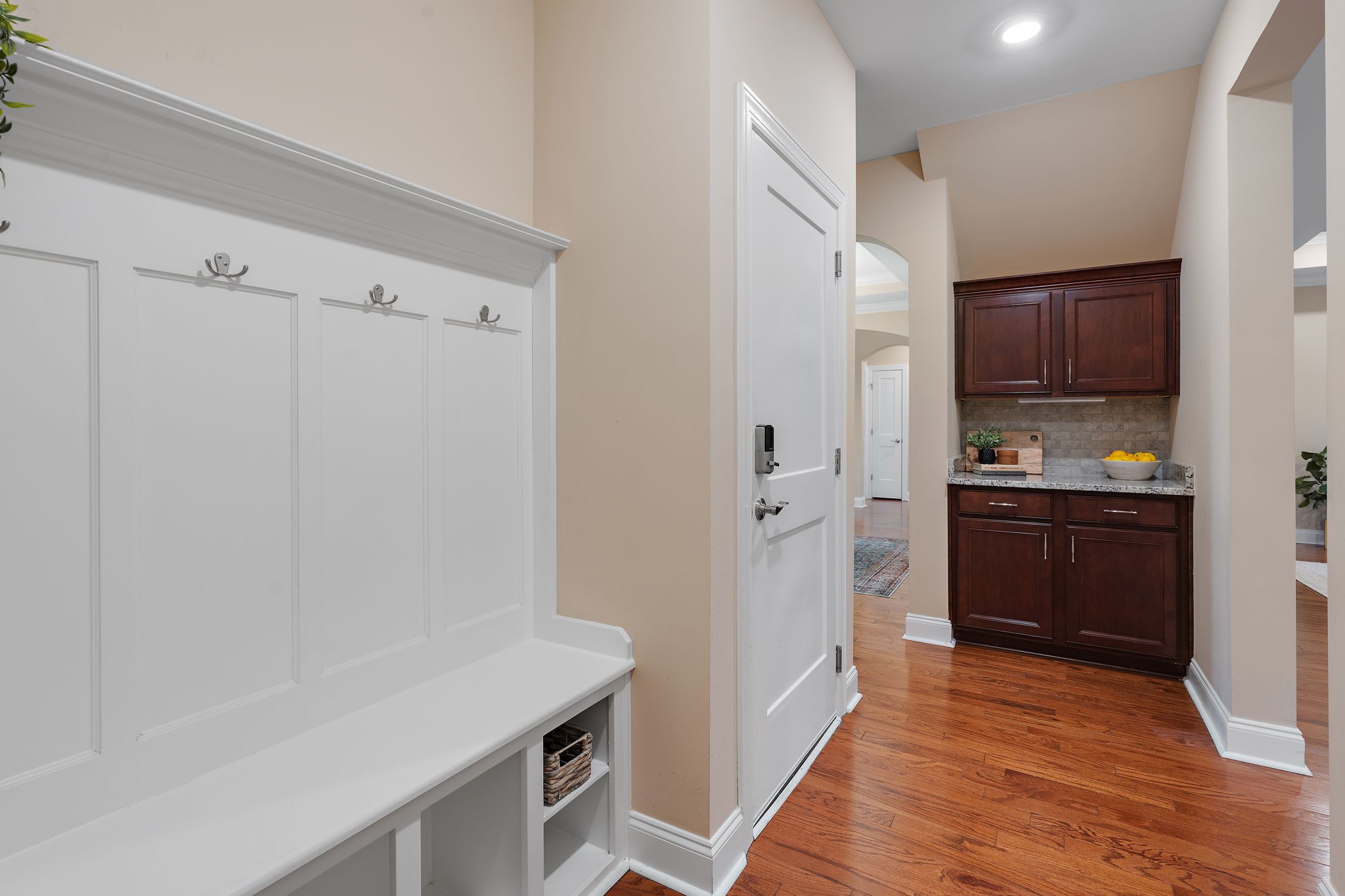 7205 Ragland Place Fairview, TN 37062 - Photo 13 of 36 Here is the hallway that connects to the dining room, garage access and laundry room.