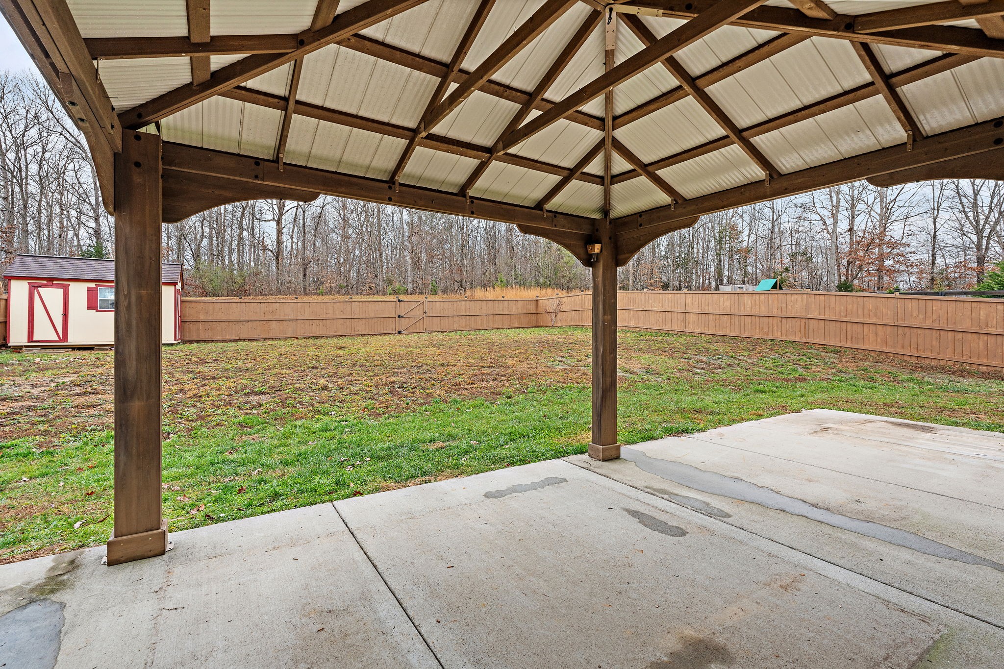 7205 Ragland Place Fairview, TN 37062 - Photo 33 of 36 Here is your massive fully fenced in backyard (***storage shed does not remain***). Upgraded concrete patio space!