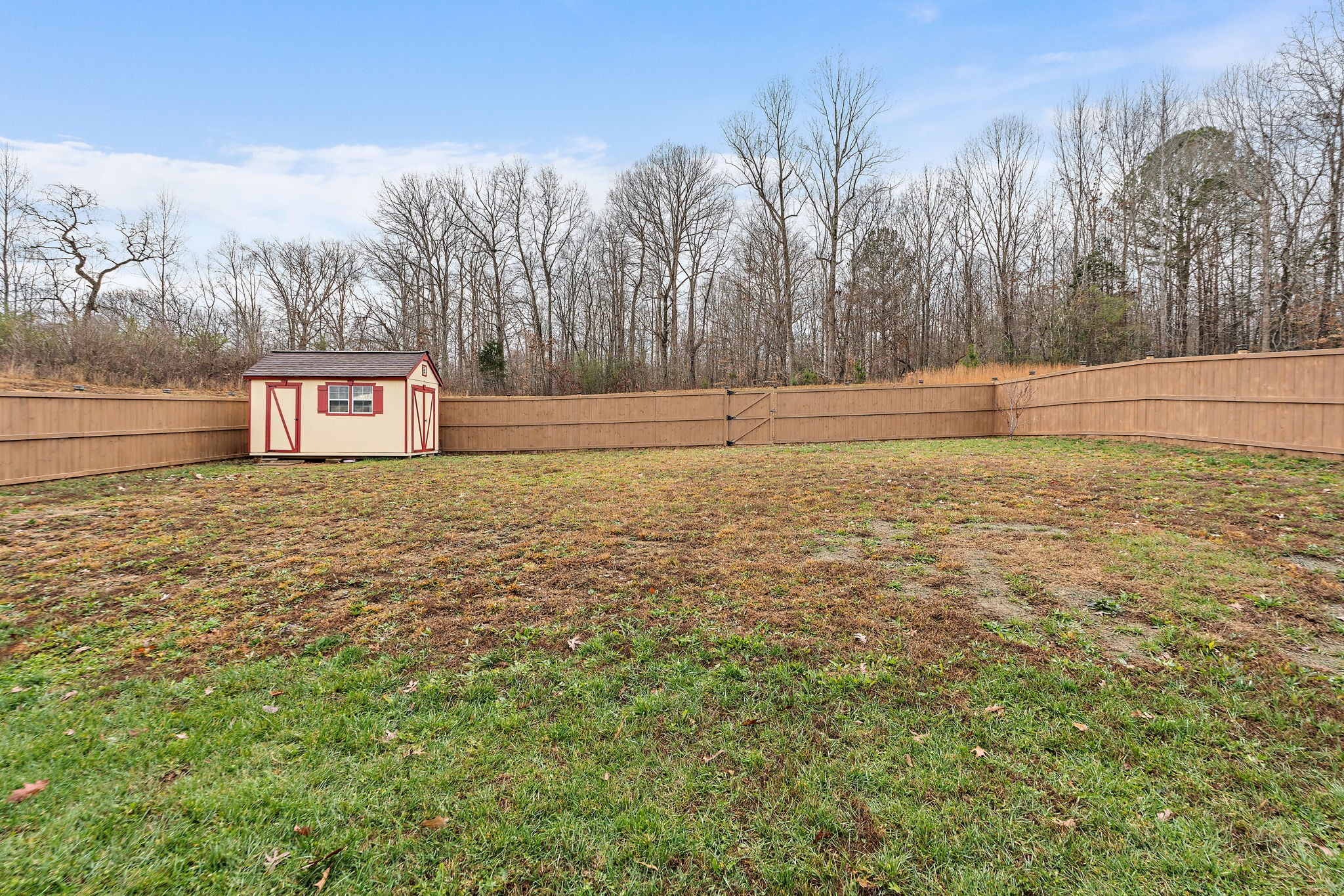 7205 Ragland Place Fairview, TN 37062 - Photo 34 of 36 Such a beautiful and private lot. It does go past the fenced in space a bit (***storage shed does not remain***).