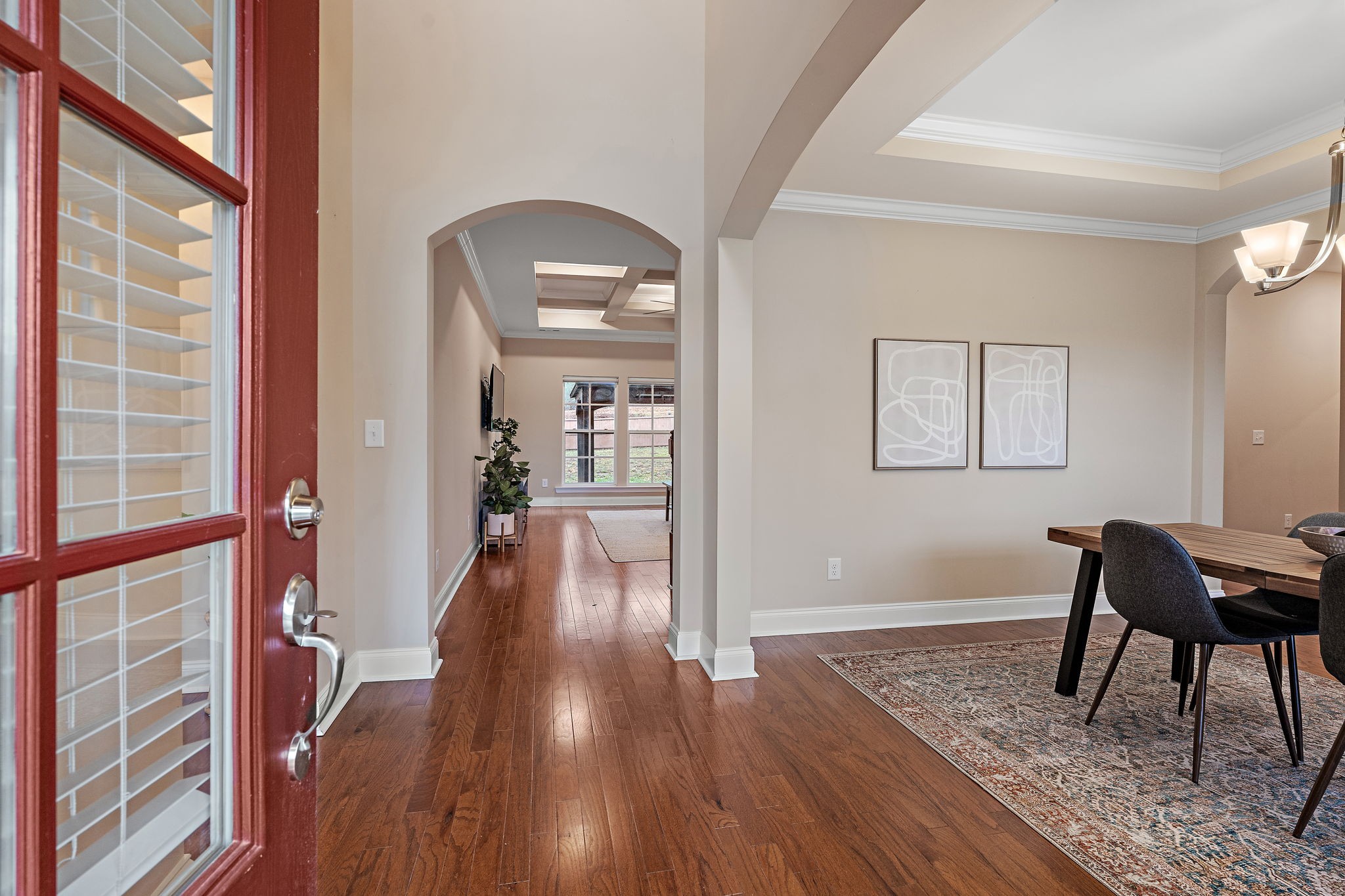7205 Ragland Place Fairview, TN 37062 - Photo 4 of 36 Upon walking in, you are greeted by an entry way. Formal dining room to the right. Guest bedroom & bathroom to the left.