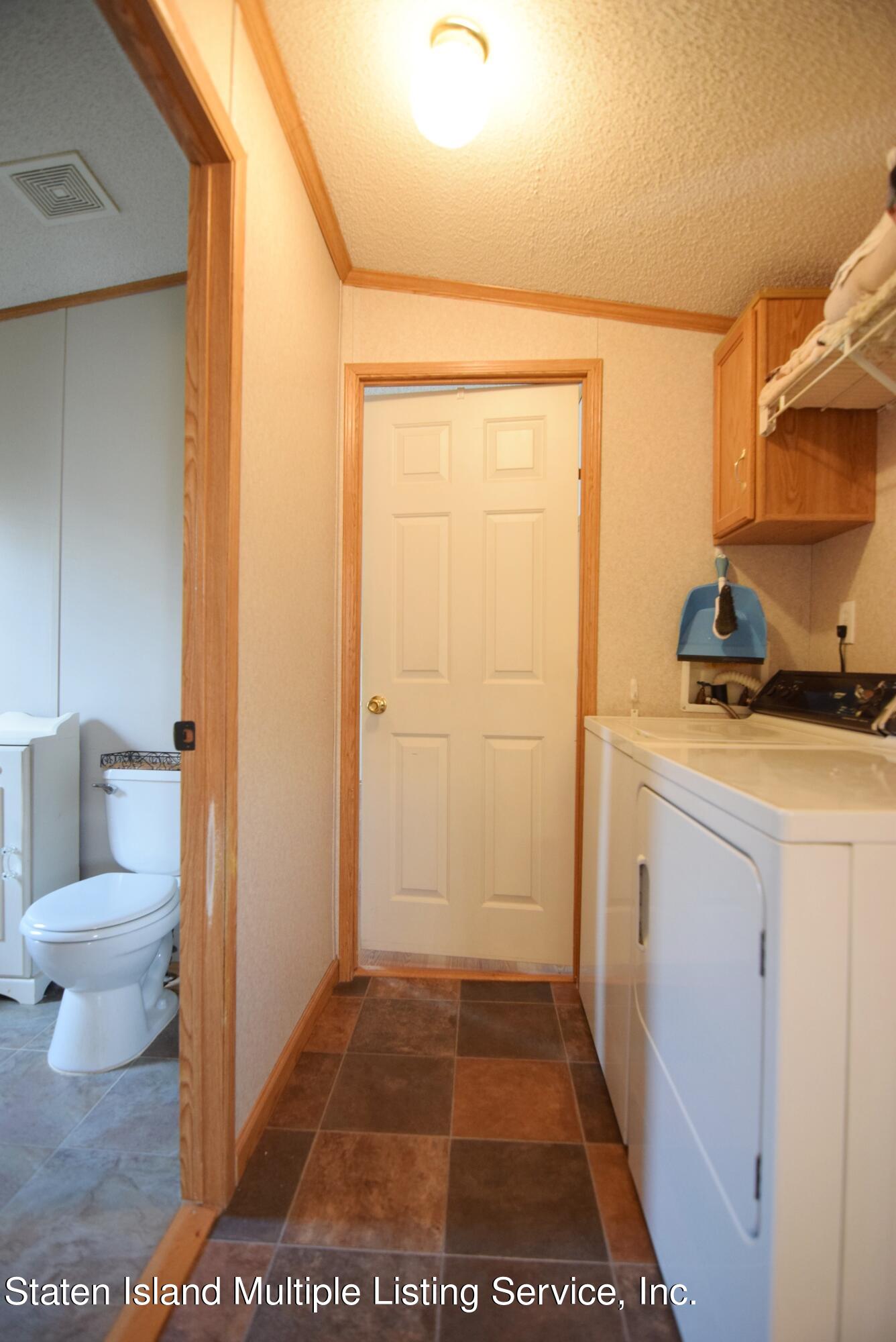 2701 Goethals Road North, Unit C2 Staten Island, NY 10303 - Photo 19 of 20 (19) HALLWAY WITH LAUNDRY SPACE
