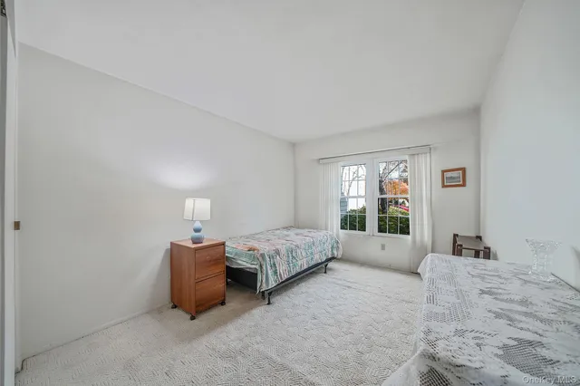 $615,000 | 113 Lakebridge Drive North, Kings Park, NY 11754