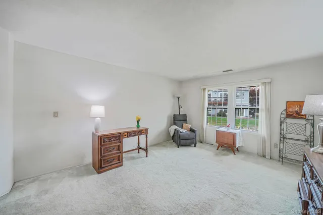 $615,000 | 113 Lakebridge Drive North, Kings Park, NY 11754