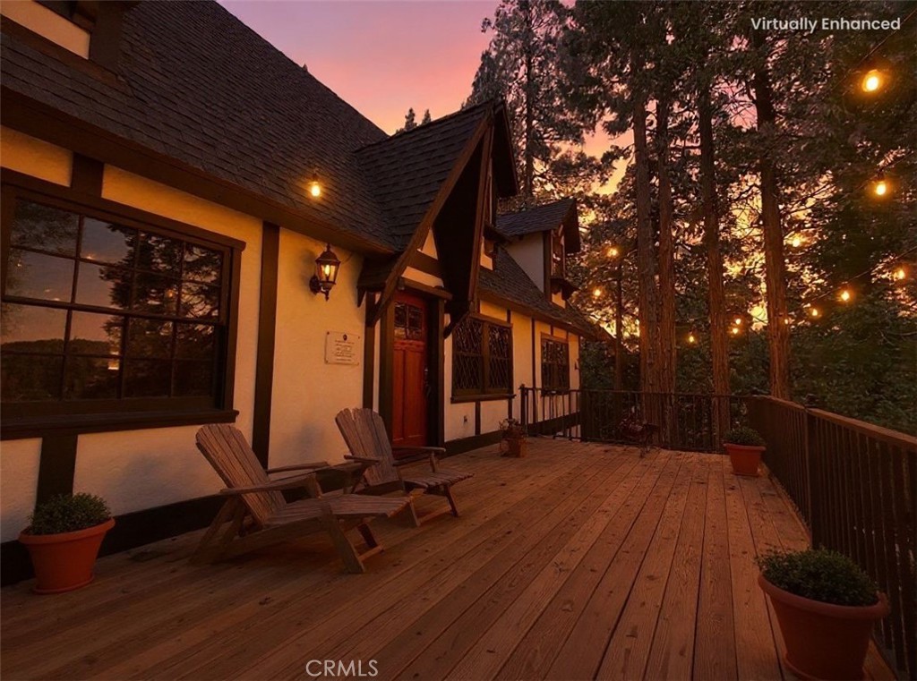 349 Golf Course Road Lake Arrowhead, CA 92352 - Photo 1 of 58 a view of a room with gym equipment and wooden fence