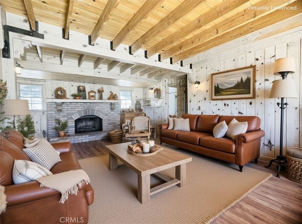 349 Golf Course Road Lake Arrowhead, CA 92352 - Photo 12 of 58 a living room with furniture and a fireplace