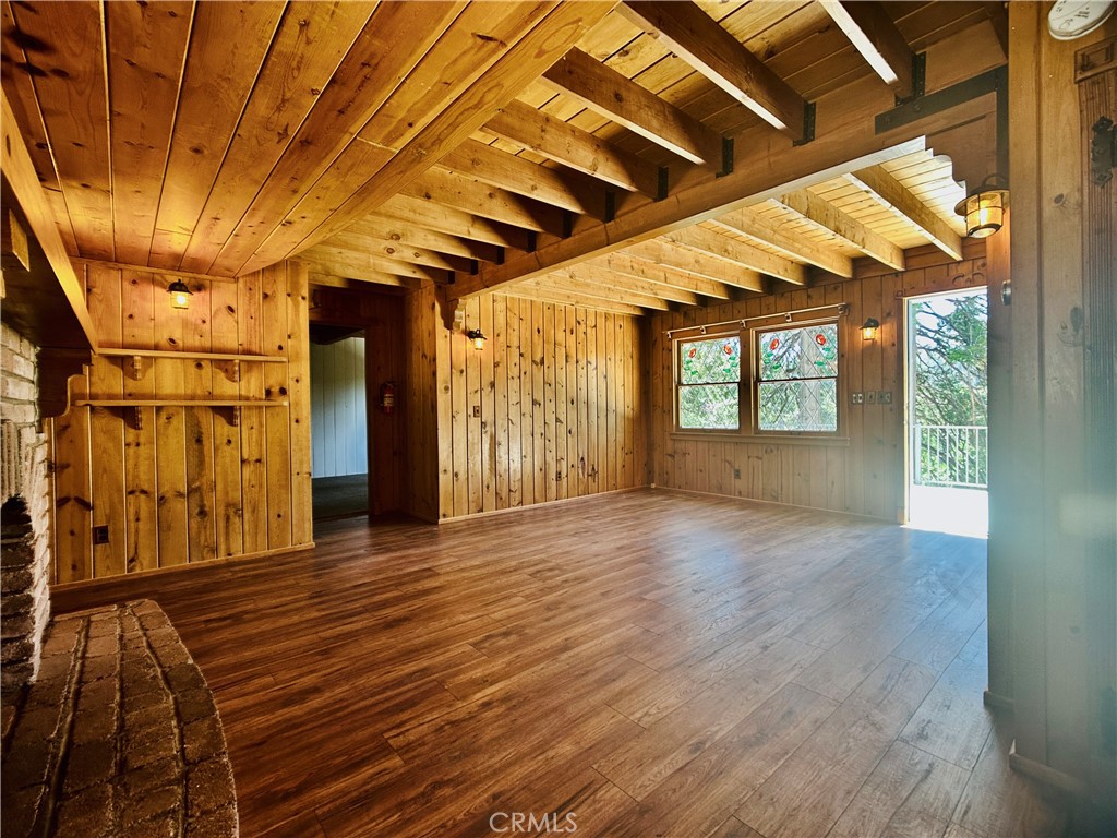 349 Golf Course Road Lake Arrowhead, CA 92352 - Photo 14 of 58 a view of an empty room with a window