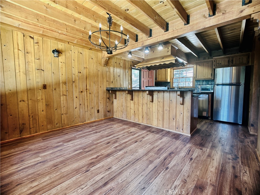 349 Golf Course Road Lake Arrowhead, CA 92352 - Photo 24 of 58 a view of a empty room with wooden floor
