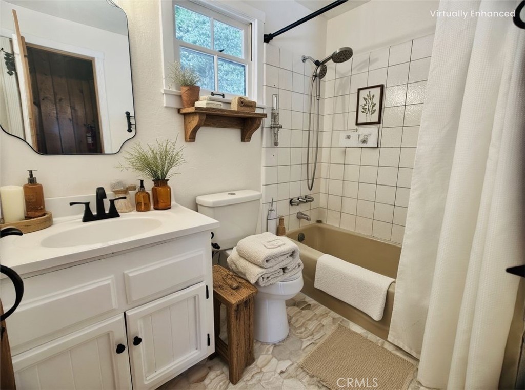 349 Golf Course Road Lake Arrowhead, CA 92352 - Photo 26 of 58 a bathroom with a sink toilet and shower