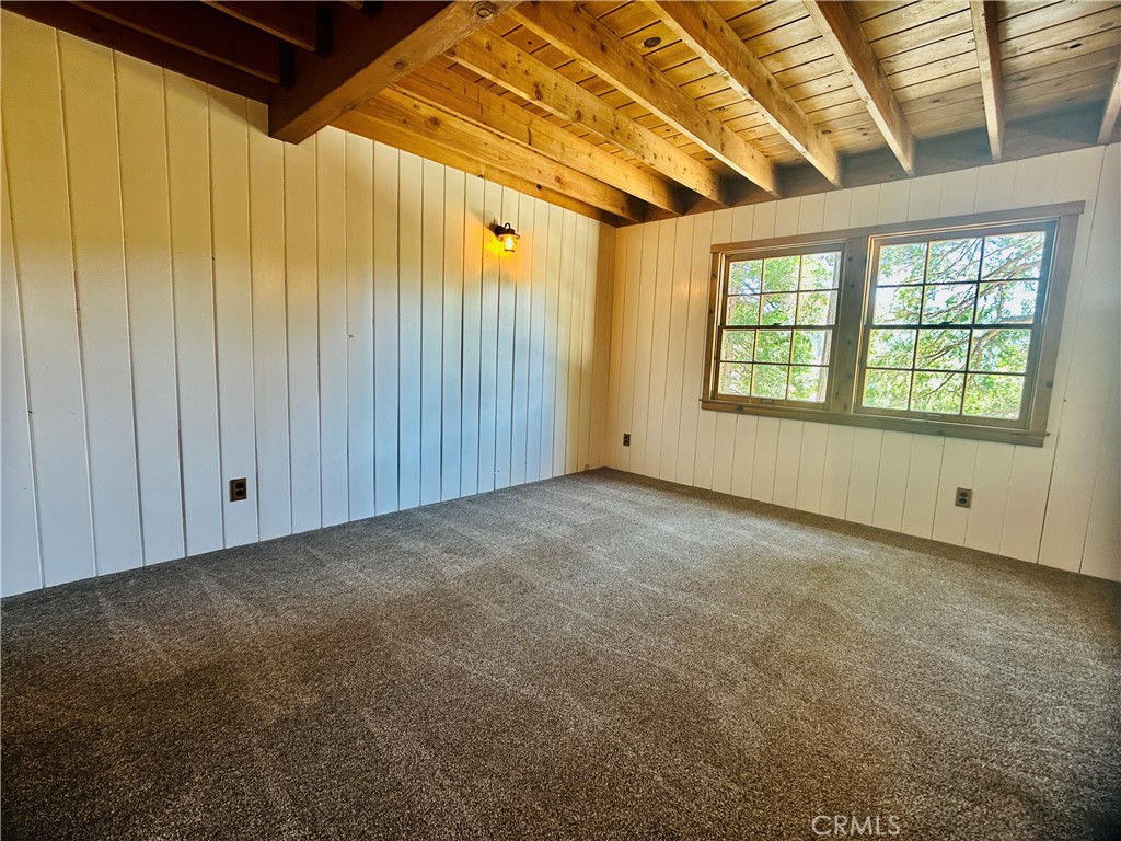 349 Golf Course Road Lake Arrowhead, CA 92352 - Photo 30 of 58 a view of an empty room with a window