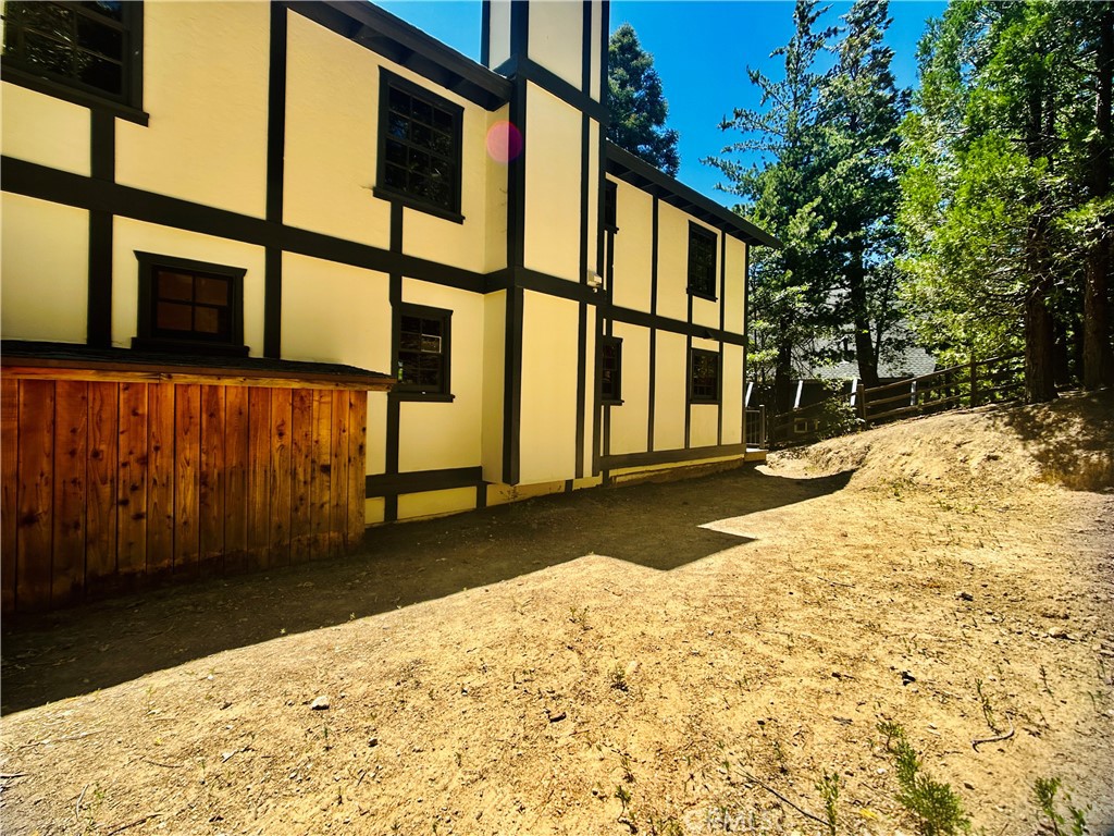 349 Golf Course Road Lake Arrowhead, CA 92352 - Photo 46 of 58 a view of a backyard of the house