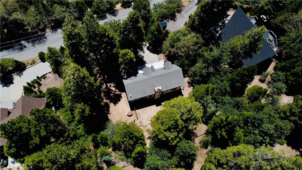 349 Golf Course Road Lake Arrowhead, CA 92352 - Photo 6 of 58 an aerial view of a house with a yard