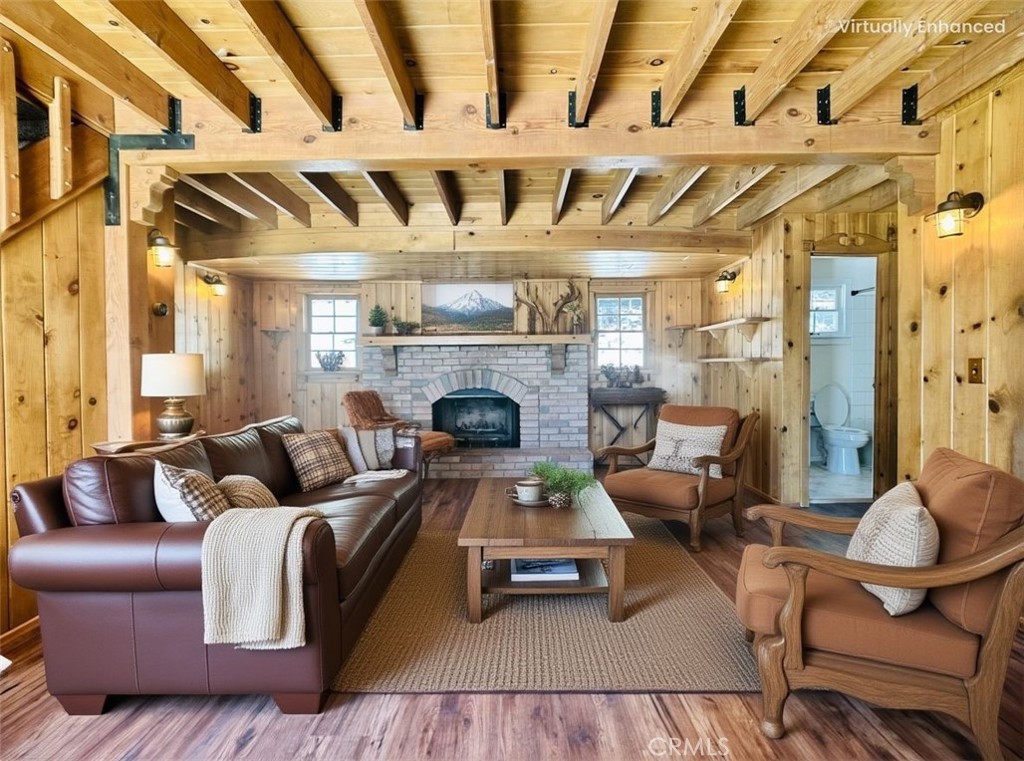 349 Golf Course Road Lake Arrowhead, CA 92352 - Photo 10 of 58 a living room with furniture and a fireplace