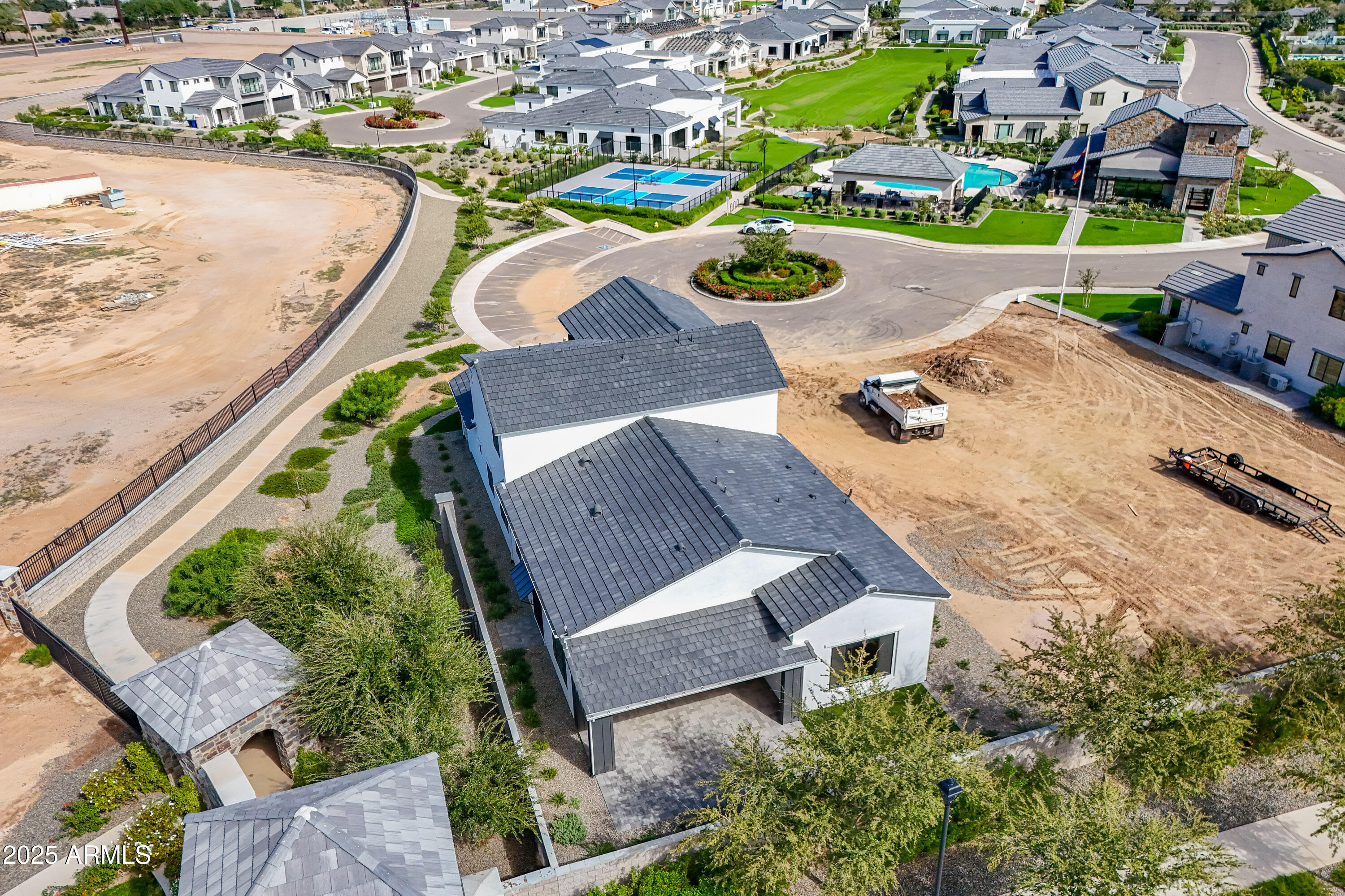 3326 South Stuart Court Gilbert, AZ 85297 - Photo 62 of 88 an aerial view of a house with a swimming pool yard and outdoor seating