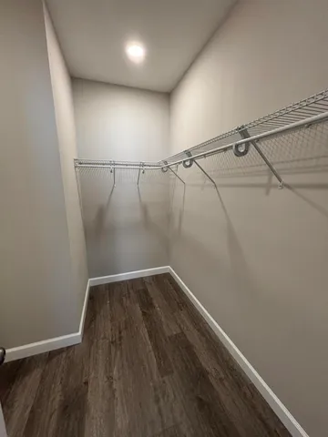 a view of a room with racks on the wall