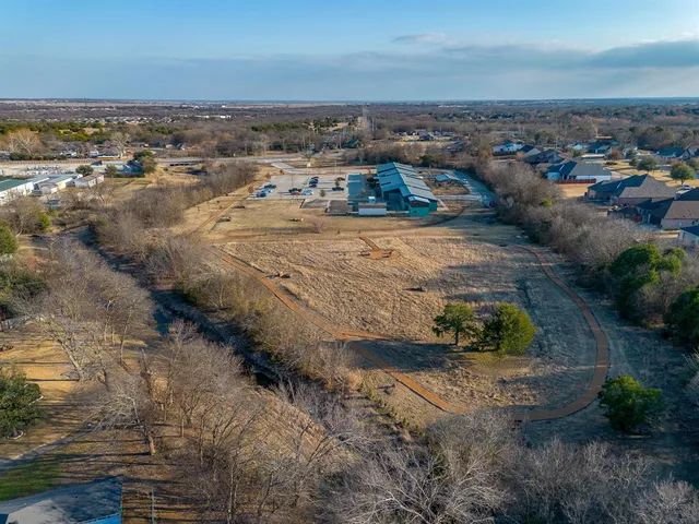 an aerial view of a houses with outdoor space